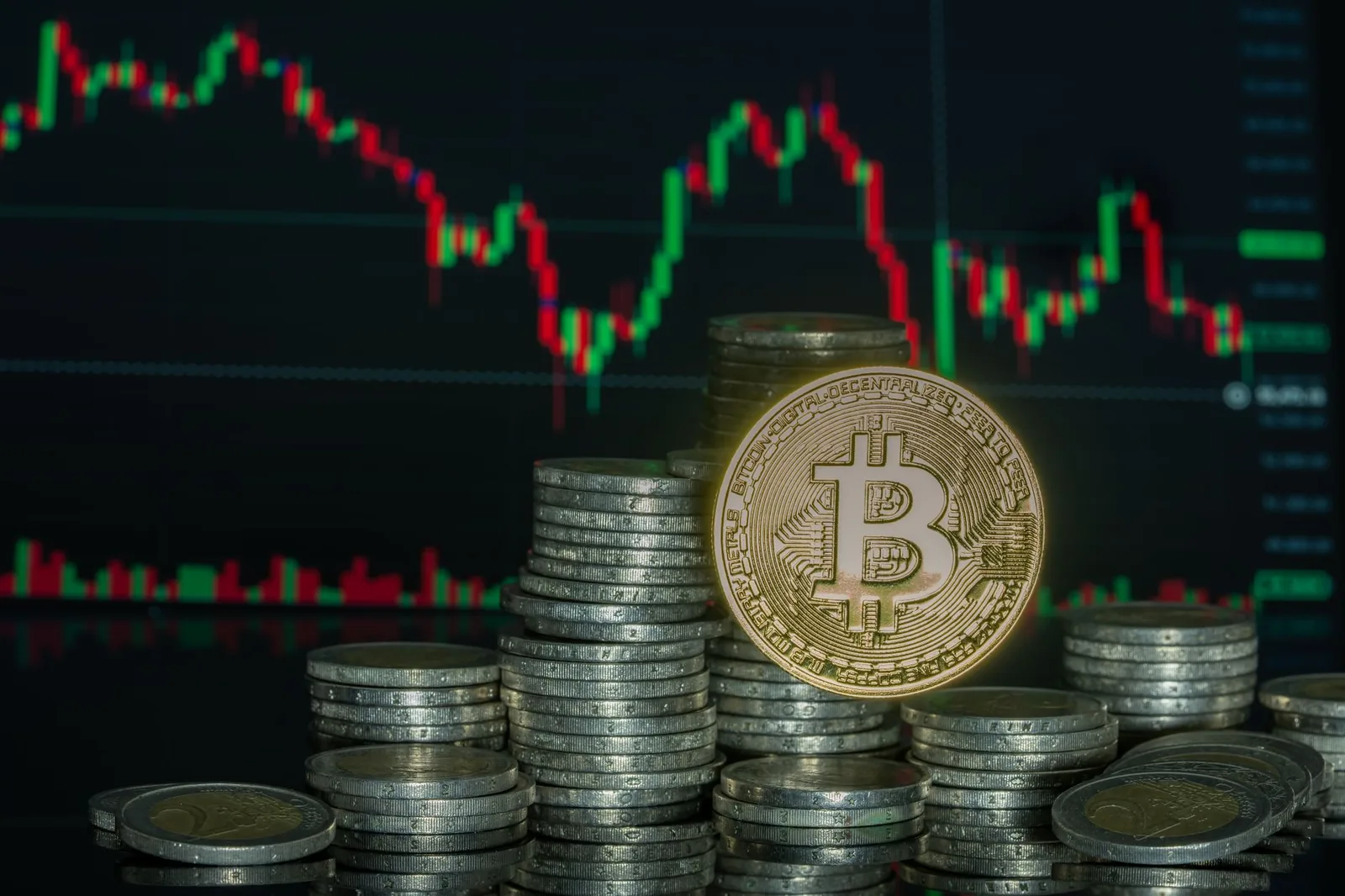 Bitcoin coins stacked with a financial graph in the background symbolize digital currency growth.