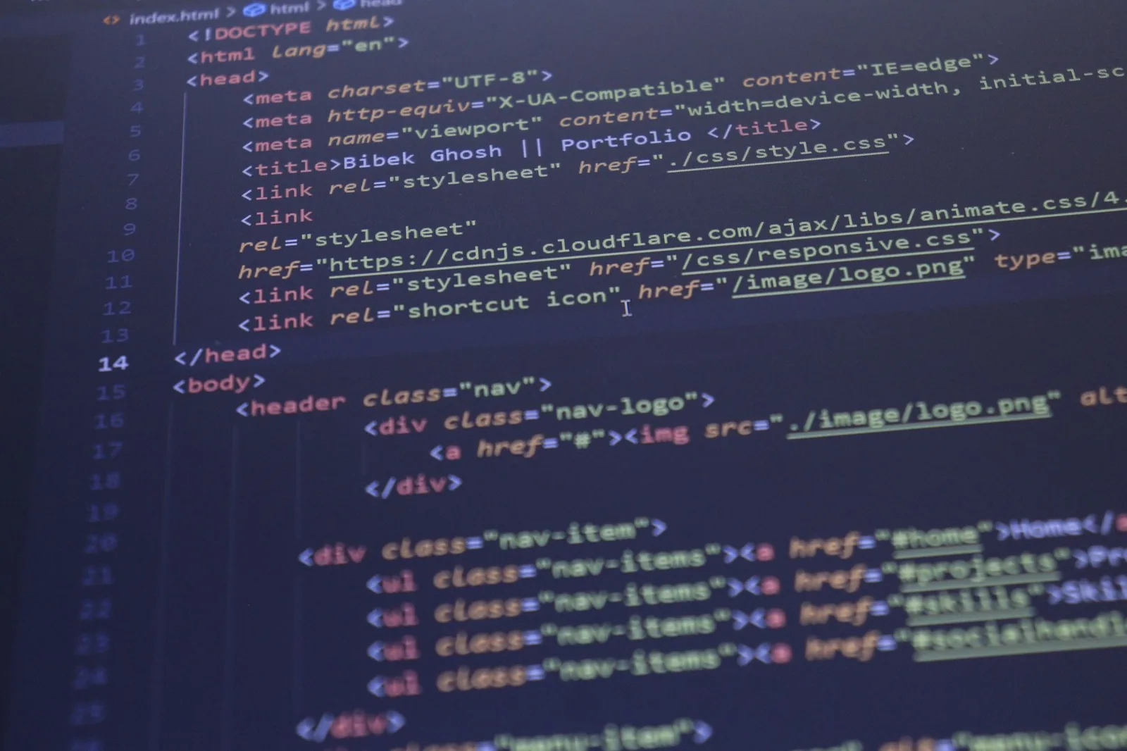 Close-up view of HTML and CSS code displayed on a computer screen, ideal for programming and technology themes.